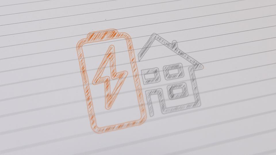 Zeichnung einer Batterie vor einem Haus