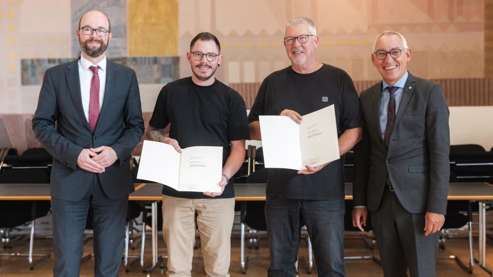 Gruppenbild mit vier Personen