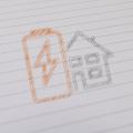 Zeichnung einer Batterie vor einem Haus