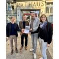 Lars Ohlig (Fachbereichsleiter III, Stadt Werl), Abteilungsleiter Thomas Sommer (Bezirksregierung Arnsberg), Werls Bürgermeister Torben Höbrink und Anja Stakemeier (Fördermittelkoordinatorin, Stadt Werl)