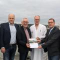 Das Bild zeigt von links: Pflegedirektor und Prokurist Jens Honert, Geschäftsführer Jürgen Beyer, Regierungsbezirkspräsident Heinrich Böckelühr, den ärztlichen Direktor PD Dr. Thomas W. Spahn, Geschäftsführer Patrick Kruscha sowie Erlösmanager und Prokurist Andreas Berlinger.